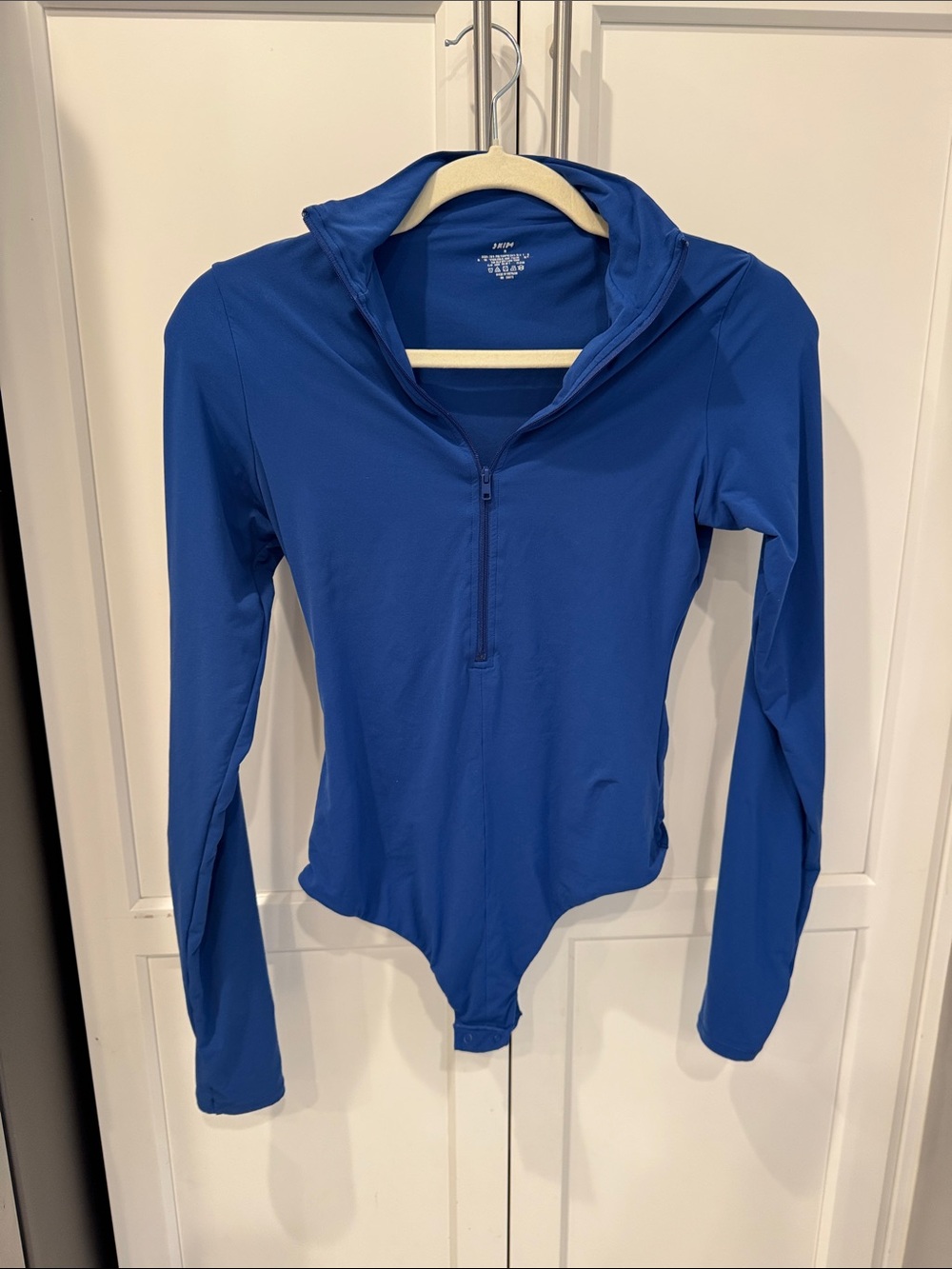 SKIMS Long-Sleeve Zip Front One-Piece Swimsuit in Royal Blue